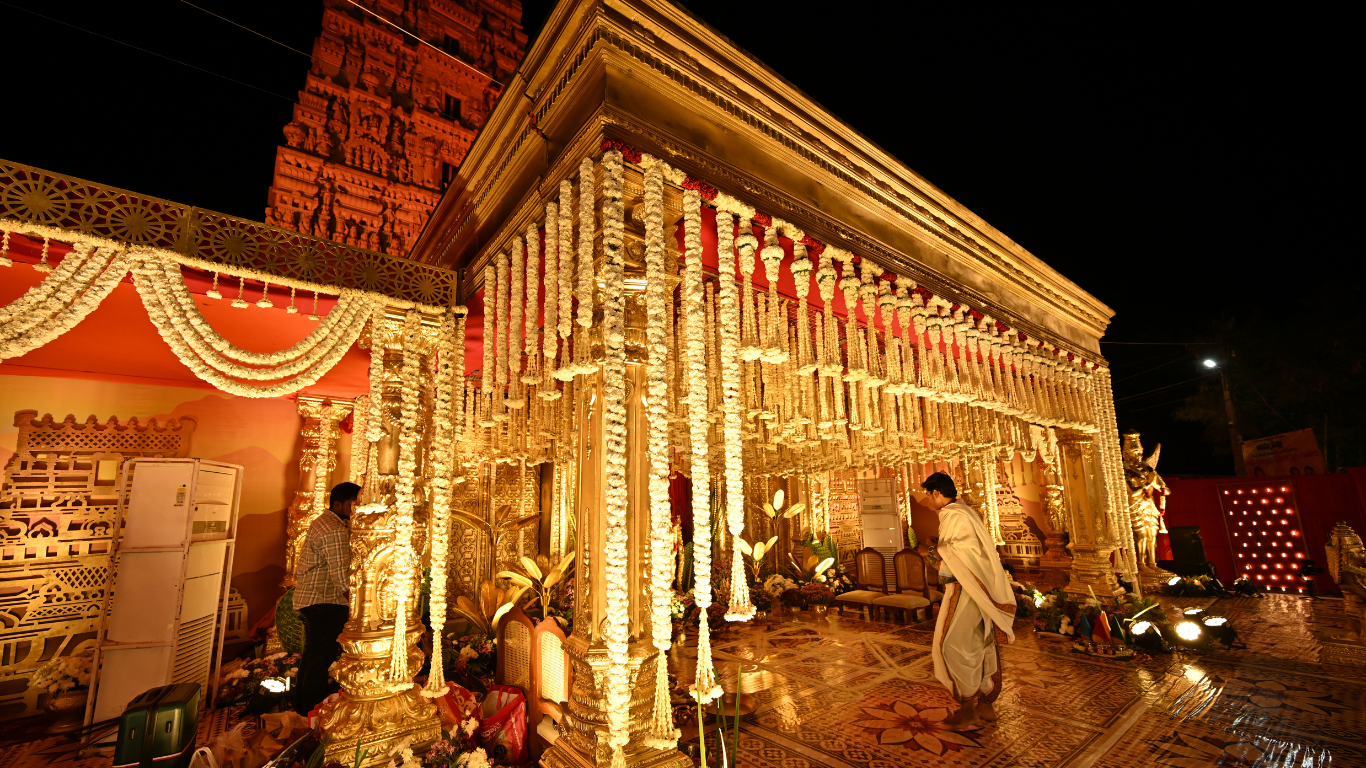 Side view of Ammapalli temple mandap with jasmine garlands